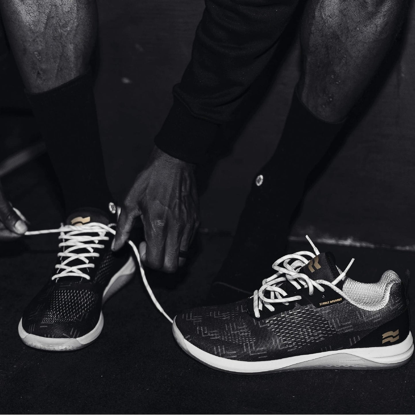 Strike Mvmnt Haze EZ Trainer Phantom Black / Classic White / Gold Monogram